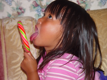 Kasen eating a huge lollipop